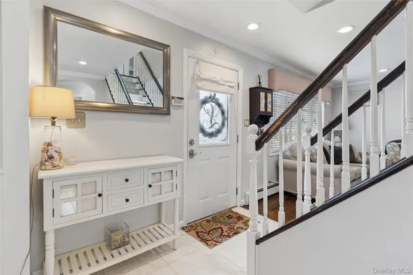 a view of an entryway with furniture