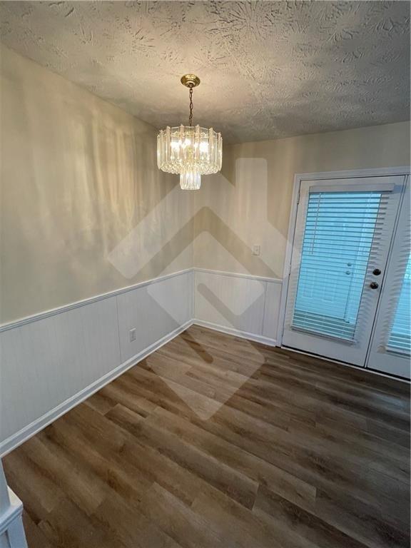 4267 Grogan Street Acworth, GA 30101 - Photo 13 of 37 a view of empty room with wooden floor