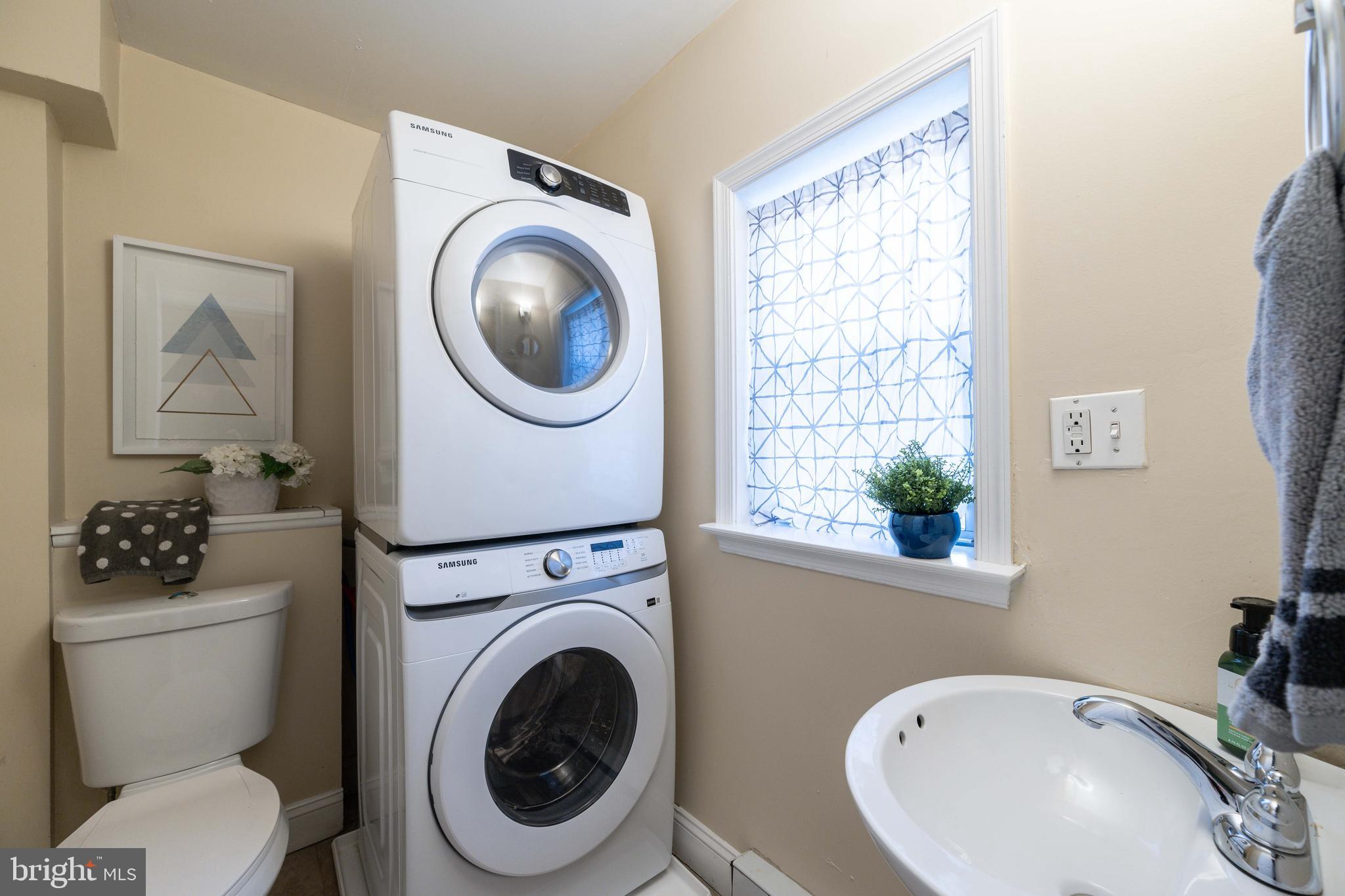 3 East Ostend Street Baltimore, MD 21230 - Photo 18 of 25 a utility room with sink washer and dryer