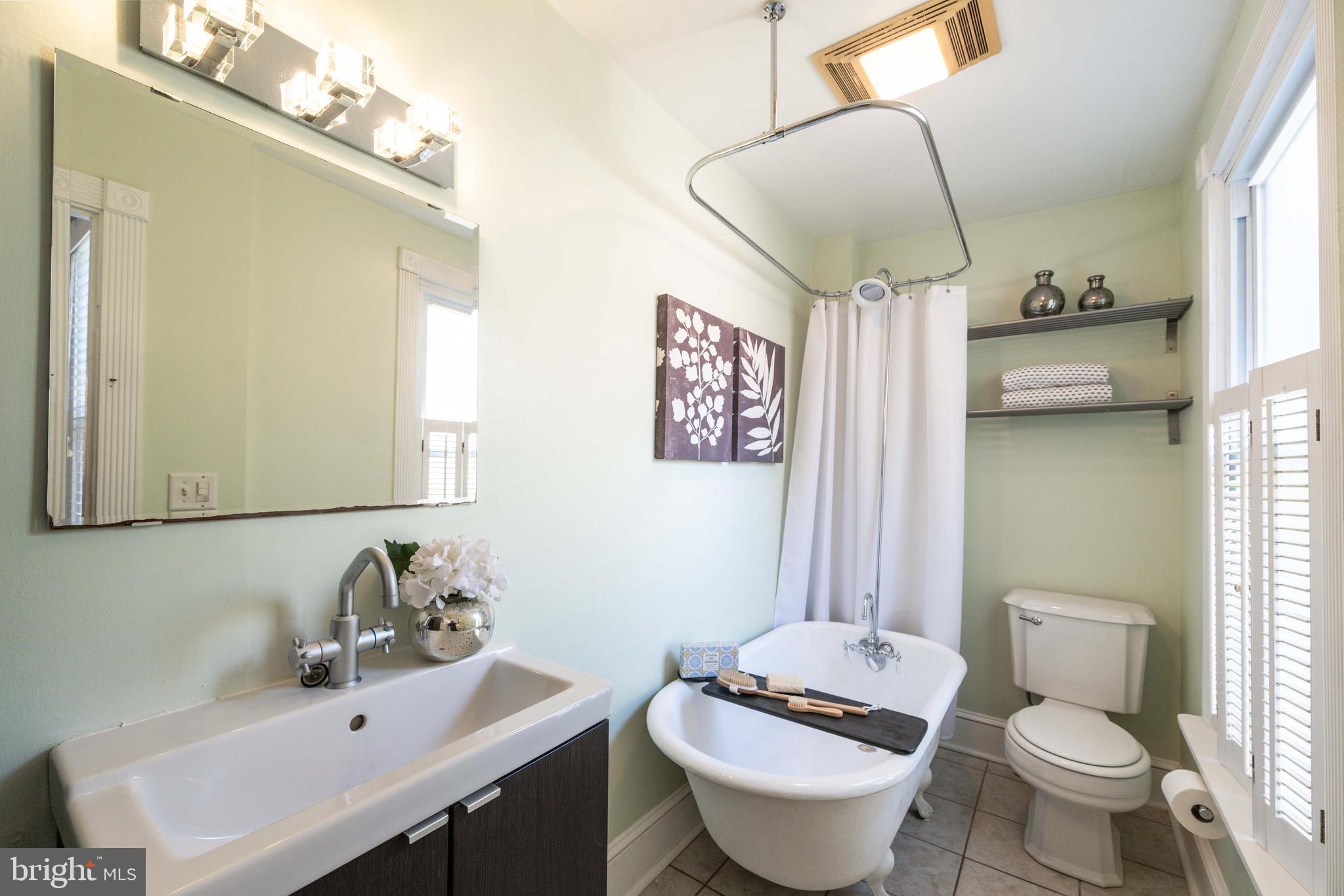 3 East Ostend Street Baltimore, MD 21230 - Photo 24 of 25 a bathroom with a sink toilet and shower