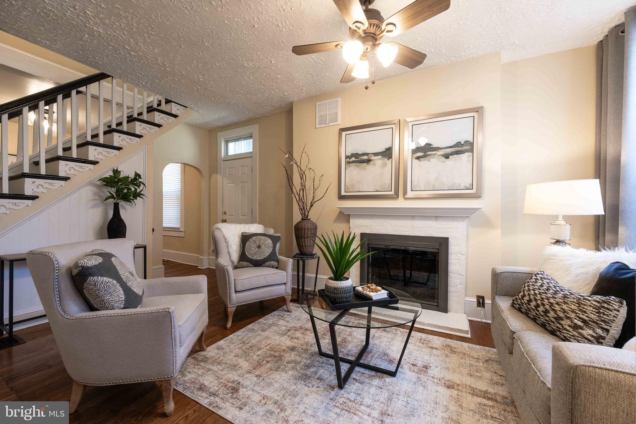 3 East Ostend Street Baltimore, MD 21230 - Photo 5 of 25 a living room with furniture and a fireplace
