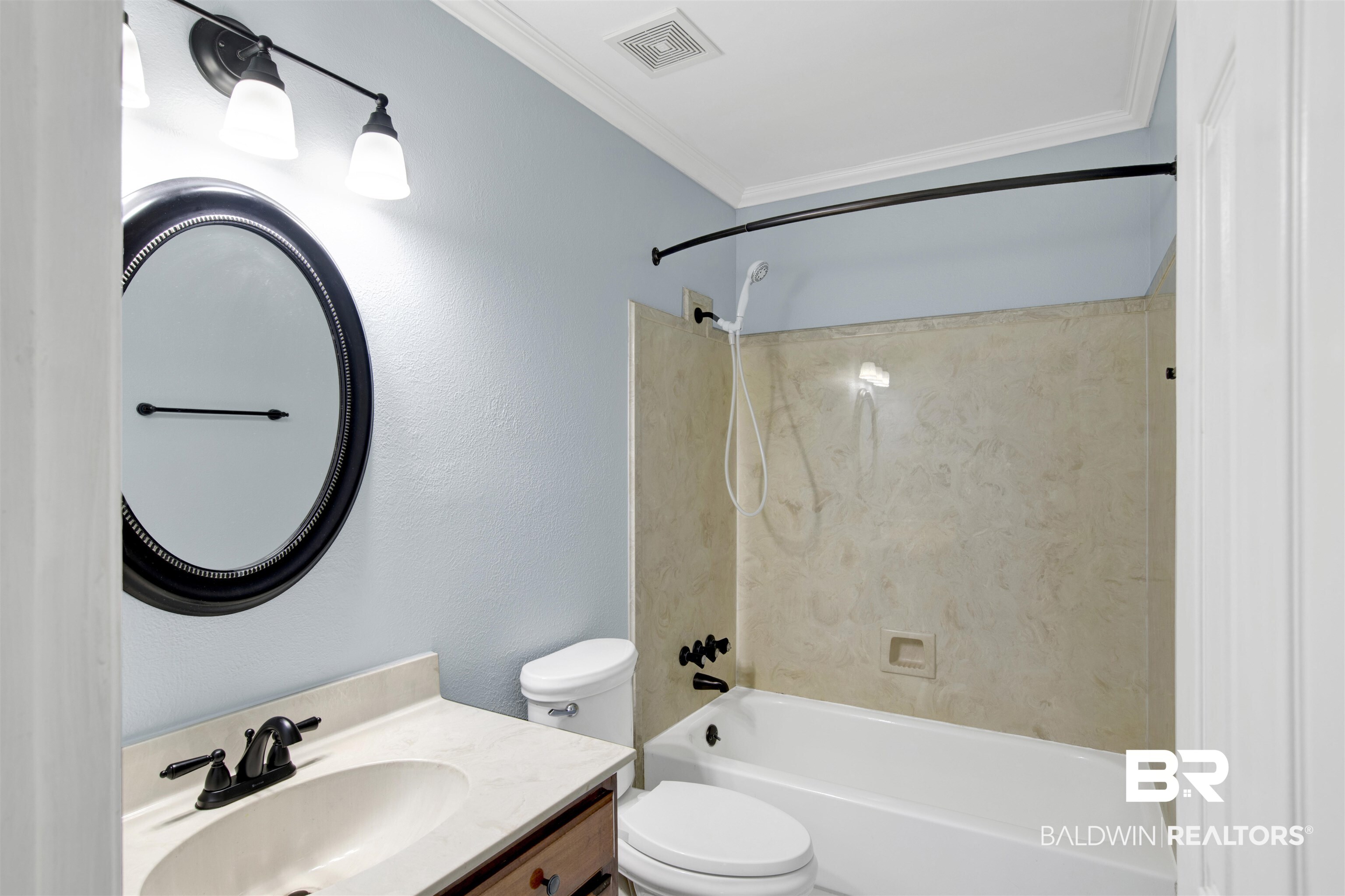 3011 Olde Gate Road Mobile, AL 36695 - Photo 20 of 35 Bathroom with bathing tub / shower combination, vanity, and crown molding