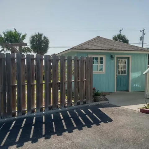 a view of a golf course with a lake