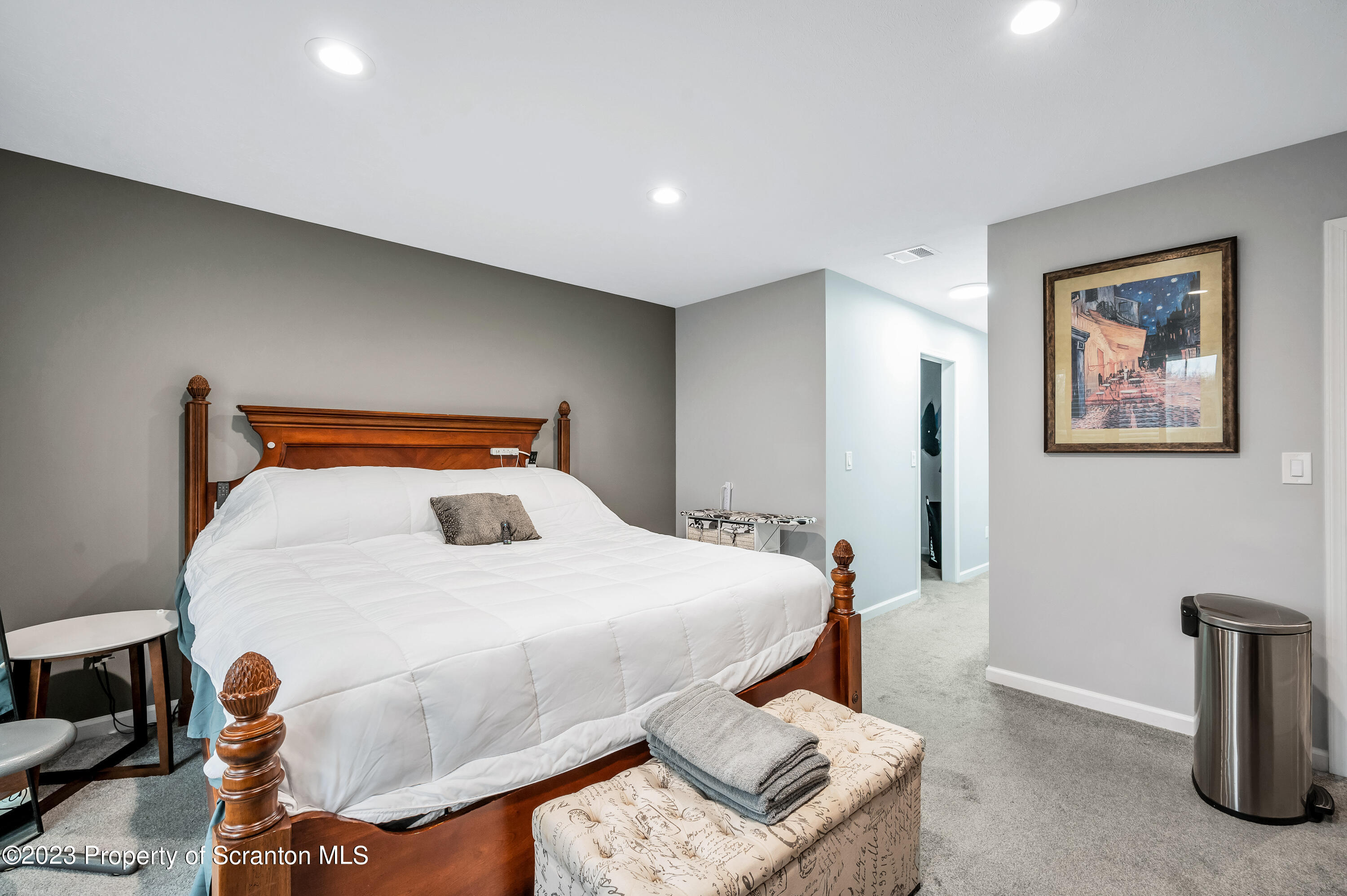 171 Golden Gate Circle Circle Archbald, PA 18403 - Photo 21 of 38 a bedroom with a bed and wooden floor