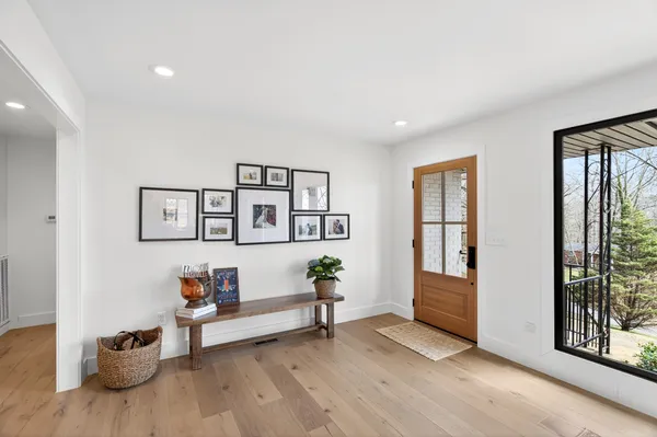 a view of a livingroom with furniture and windows