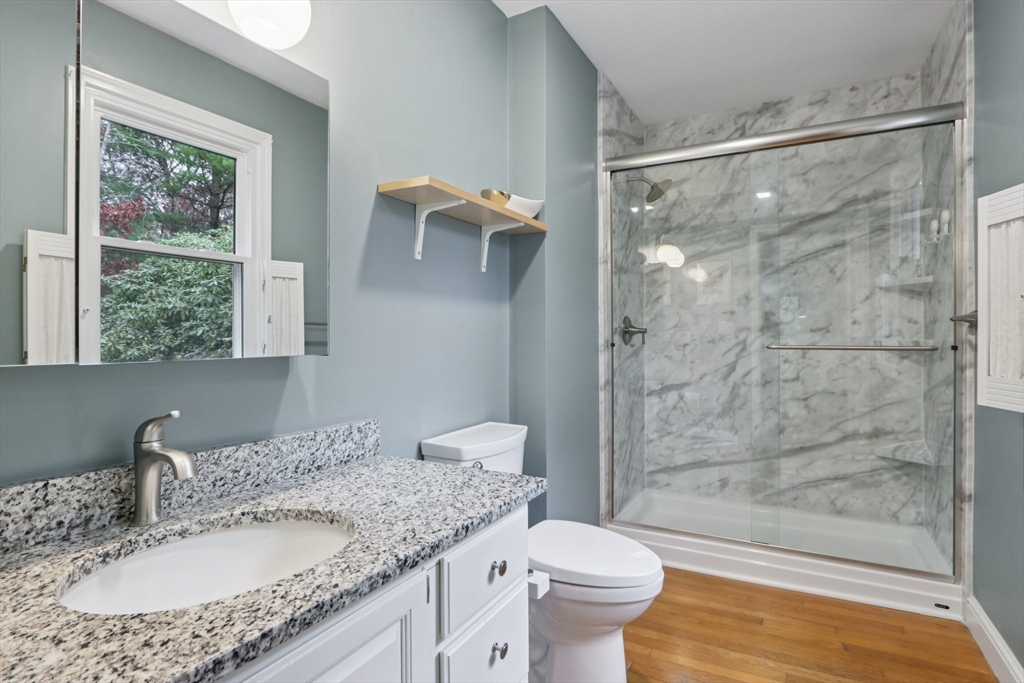 19 Roosevelt Road Plymouth, MA 02360 - Photo 19 of 35 a bathroom with a granite countertop sink toilet and shower
