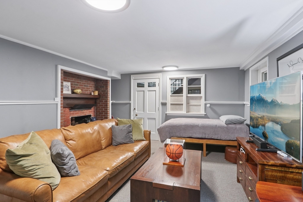 19 Roosevelt Road Plymouth, MA 02360 - Photo 27 of 35 a living room with furniture and a window