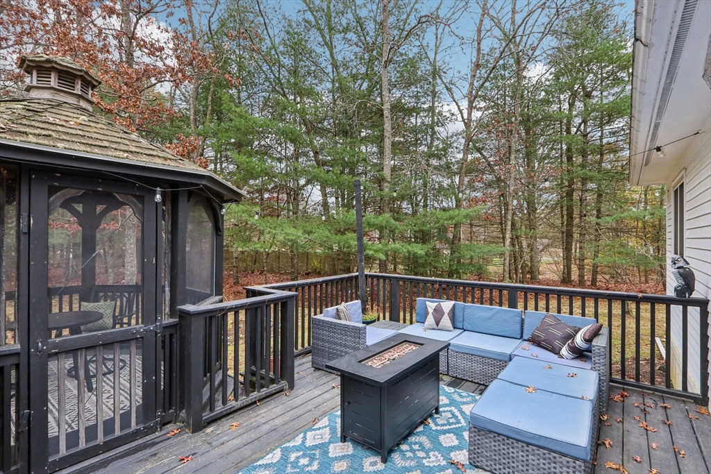 19 Roosevelt Road Plymouth, MA 02360 - Photo 32 of 35 a view of roof deck with furniture and trees around