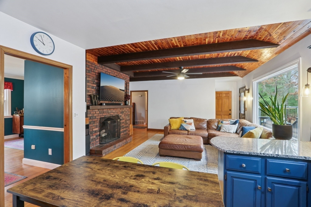 19 Roosevelt Road Plymouth, MA 02360 - Photo 9 of 35 a living room with furniture and a fireplace