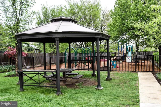 a table and chairs in the garden