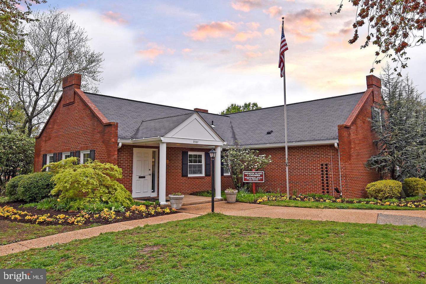 2829 South Abingdon Street, Unit B Arlington, VA 22206 - Photo 18 of 18 a view of a house with a yard and plants