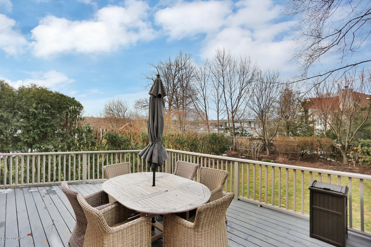 31 Chapel Lane Riverside, CT 06878 - Photo 36 of 43 a view of a chairs and table on the deck