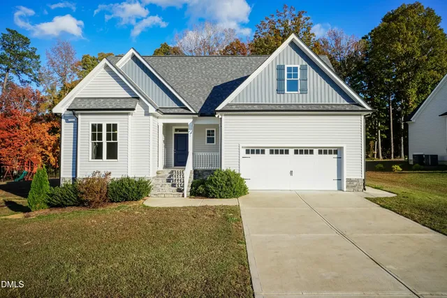 a house with trees in front of it