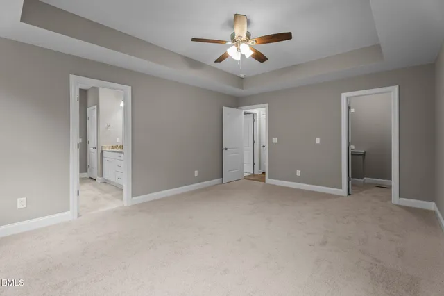 a view of a room with wooden floor and balcony