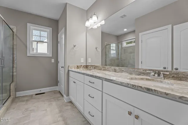 a view of a house with deck and a yard