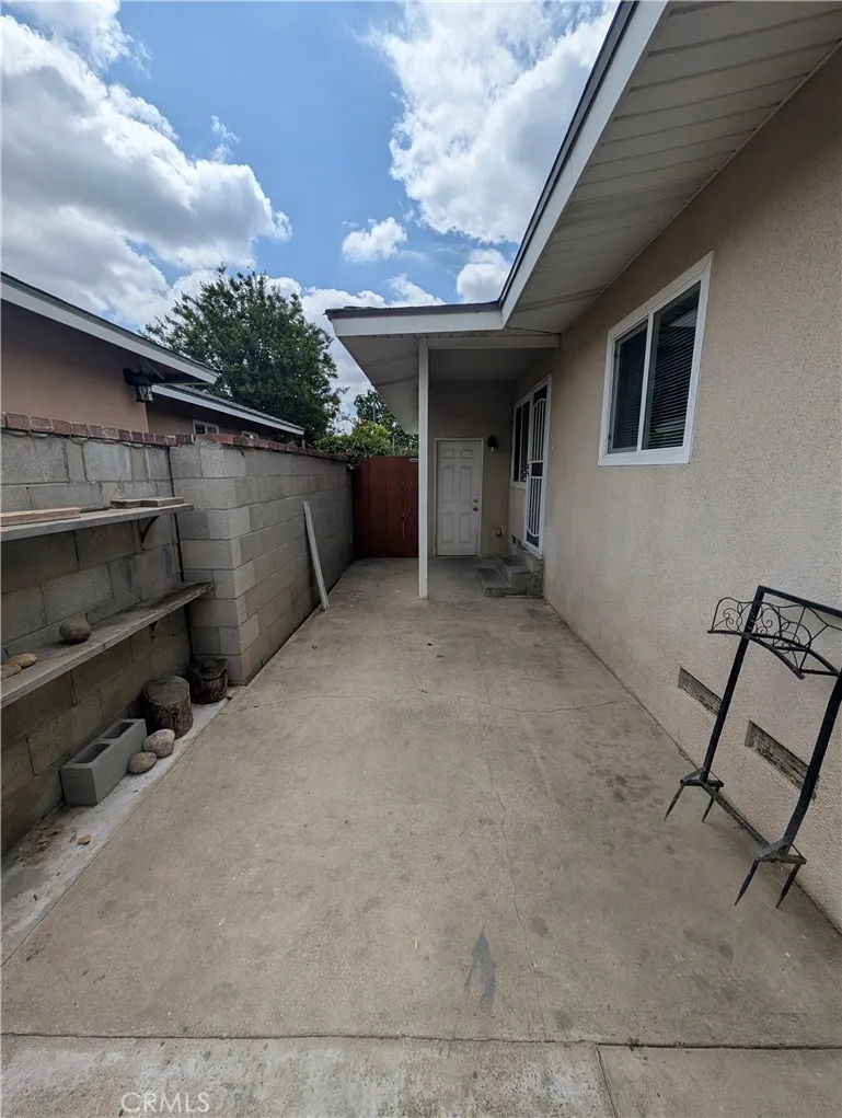 8641 Garfield Street, Unit 1 Riverside, CA 92504 - Photo 17 of 19 a view of a porch