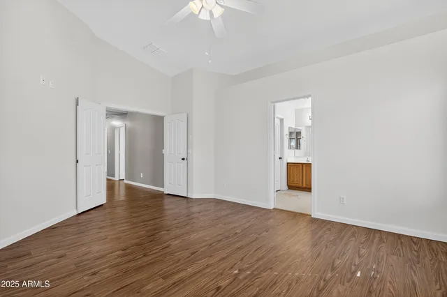 a bathroom with 2 sink and a mirror