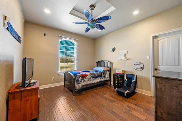 a living room with furniture fireplace and window