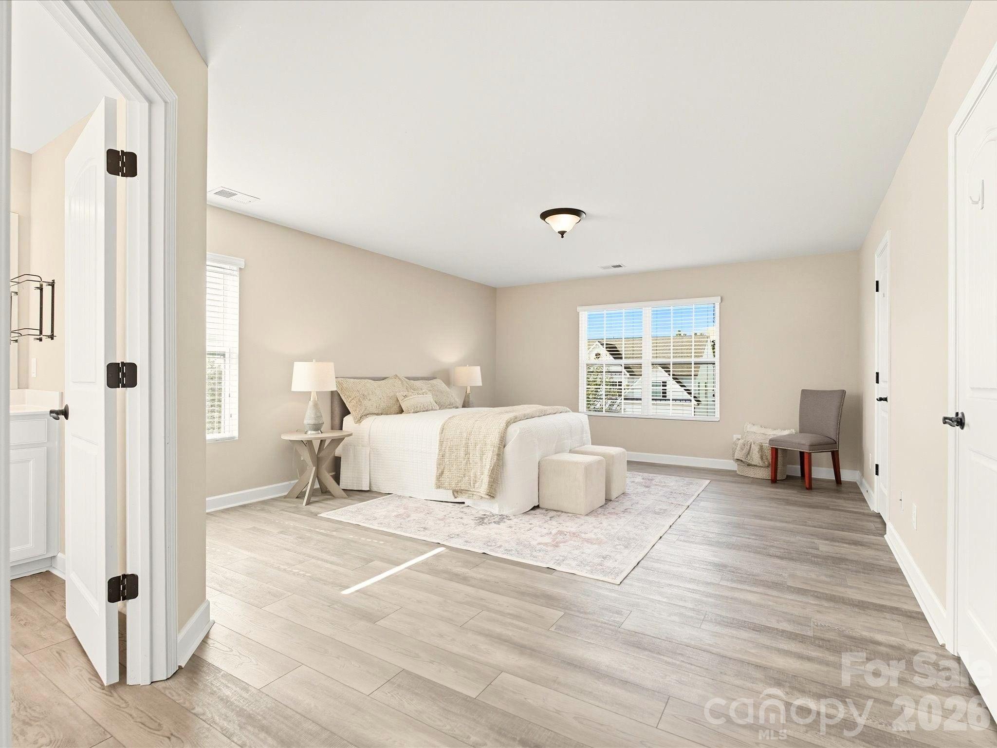7196 Dove Field Lane Fort Mill, SC 29707 - Photo 19 of 35 a bedroom with a bed and a window