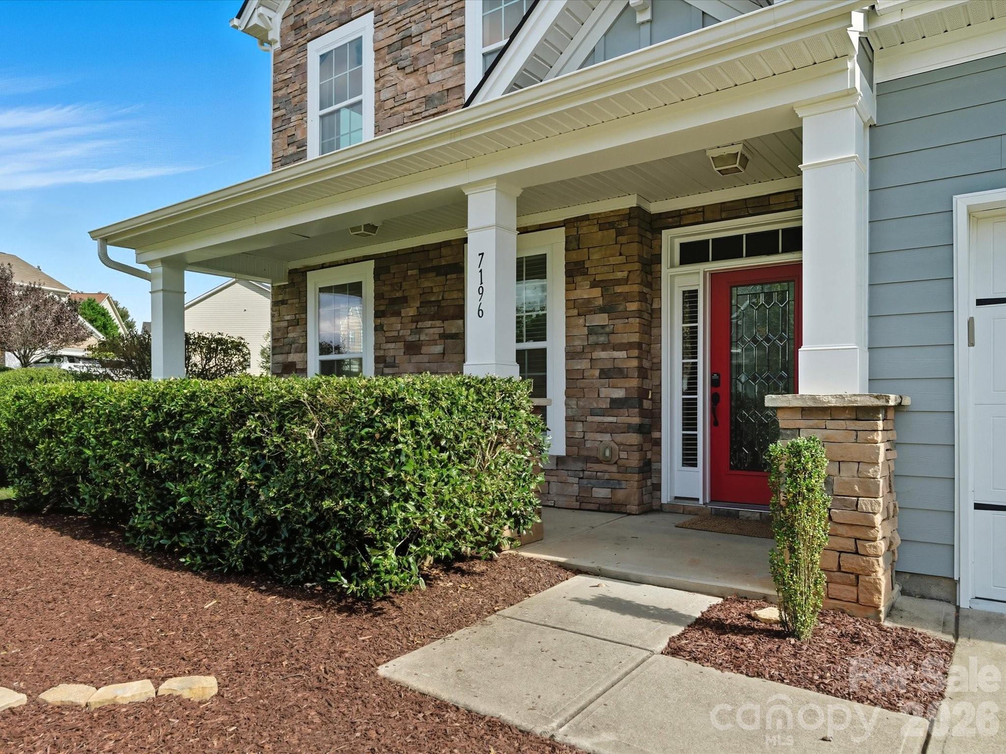 7196 Dove Field Lane Fort Mill, SC 29707 - Photo 3 of 35 a front view of a house