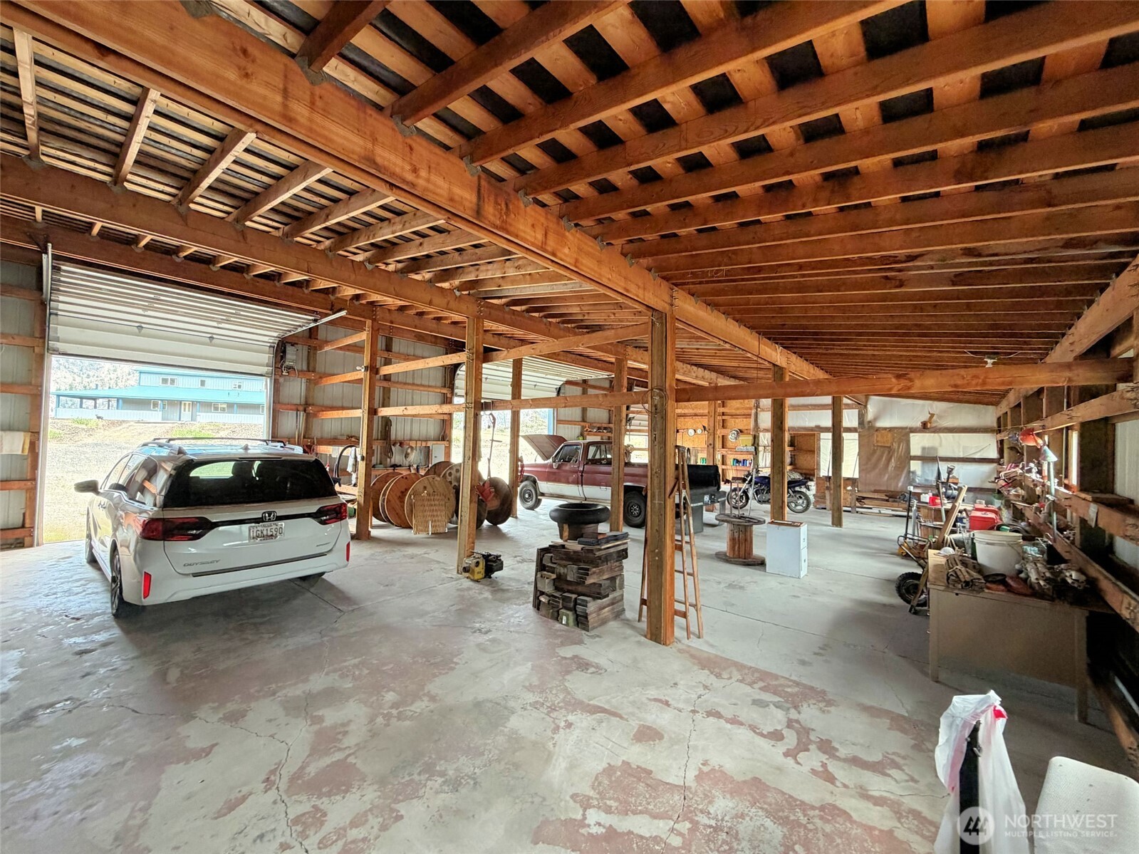 41238 Sterling Valley Road North Lincoln, WA 99147 - Photo 35 of 39 a view of parking garage with cars