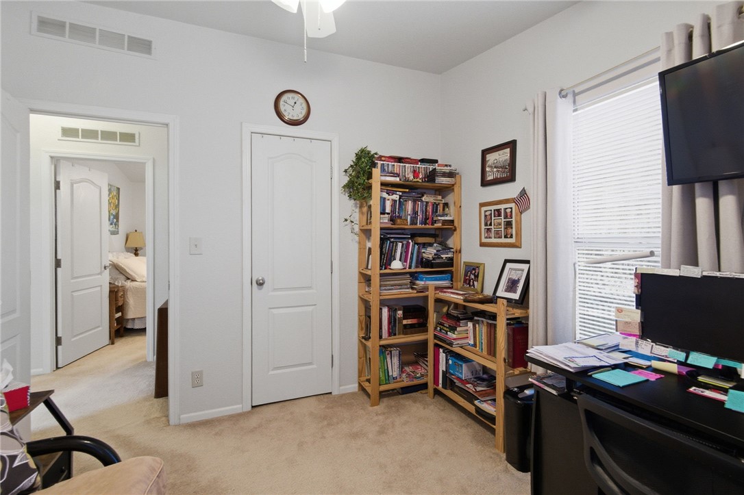 4342 Cordes Road Golden Valley, AZ 86413 - Photo 30 of 39 a view of a workspace with furniture and toys