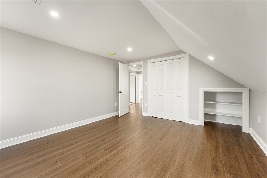 26 Maple Street Mendon, MA 01756 - Photo 29 of 42 a view of empty room with wooden floor and window