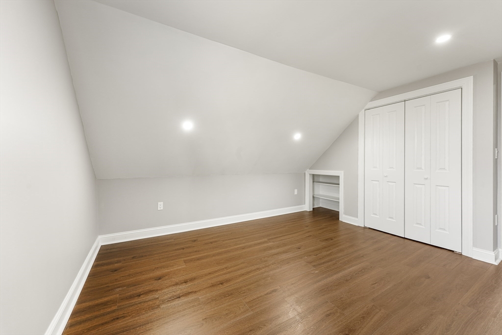 26 Maple Street Mendon, MA 01756 - Photo 34 of 42 a view of an empty room with wooden floor