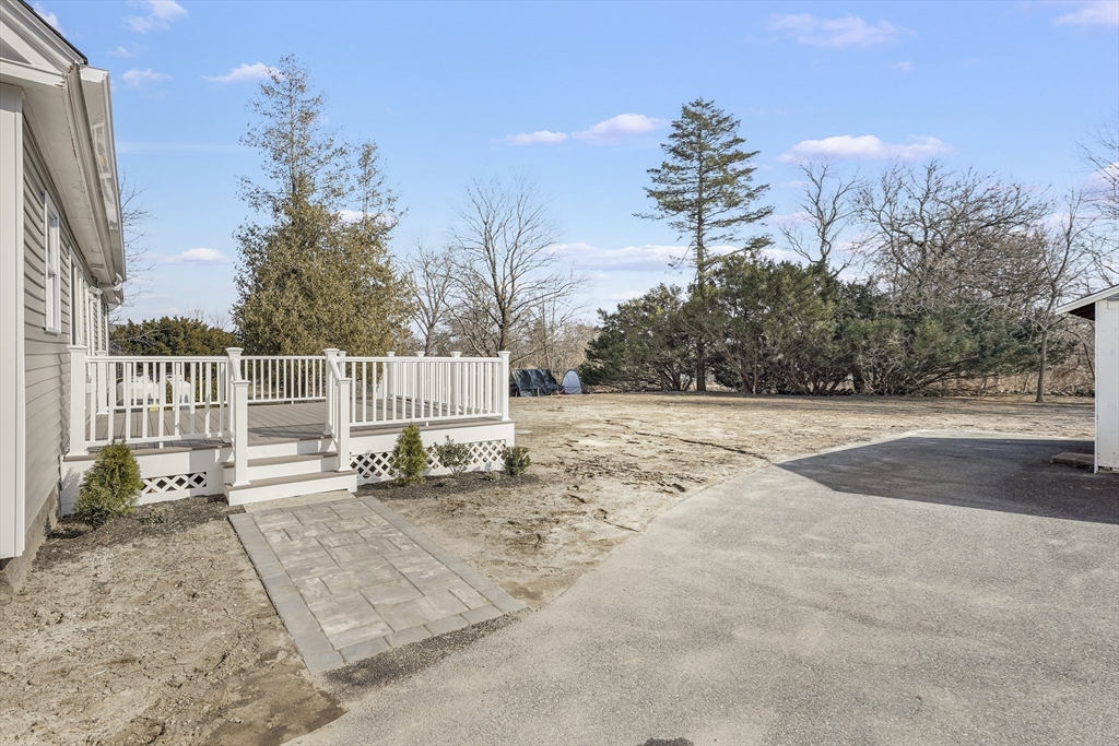 26 Maple Street Mendon, MA 01756 - Photo 40 of 42 a view of backyard with trees