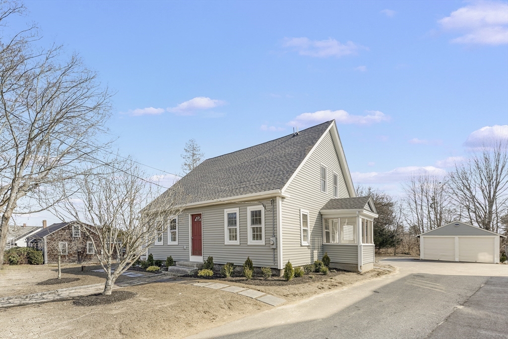 26 Maple Street Mendon, MA 01756 - Photo 42 of 42 a view of a house with a yard