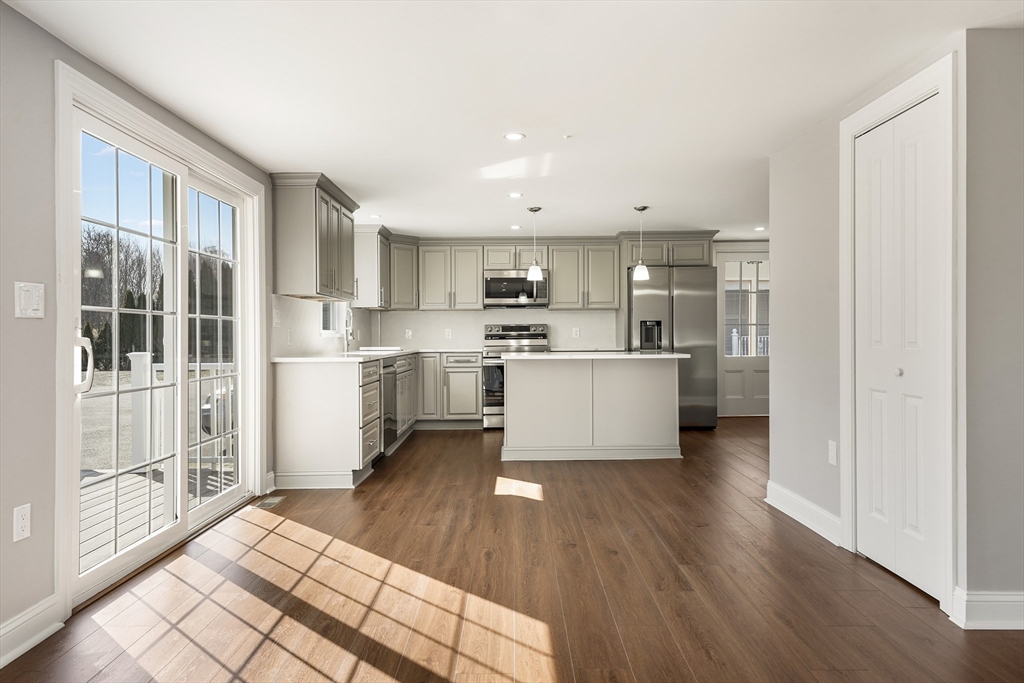26 Maple Street Mendon, MA 01756 - Photo 9 of 42 a view of kitchen with wooden floor and electronic appliances