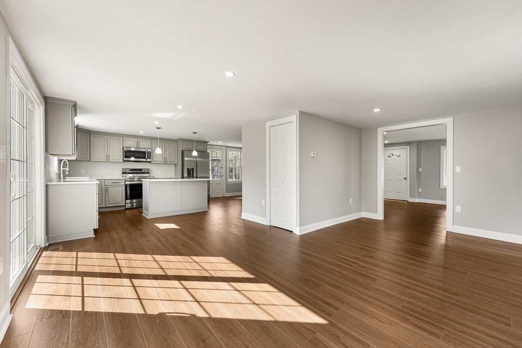 26 Maple Street Mendon, MA 01756 - Photo 10 of 42 a view of kitchen with cabinets and wooden floor