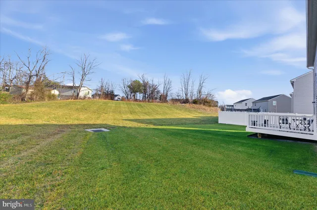 a view of a house with a big yard