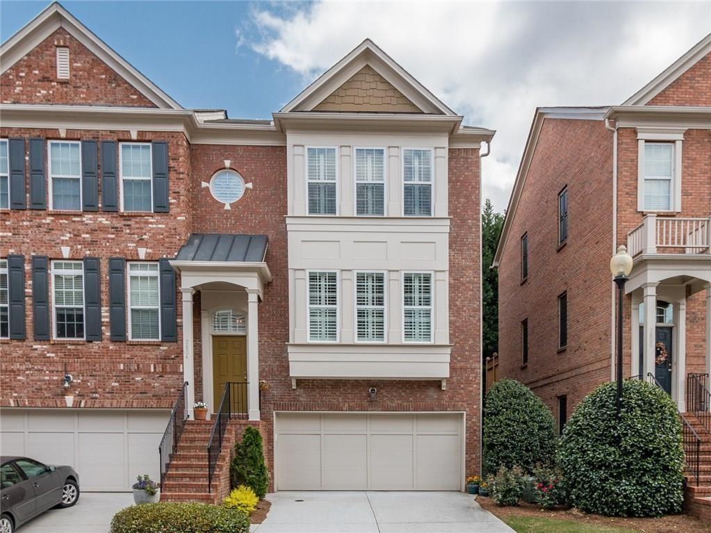 2804 Loftview Square, Unit 3 Atlanta, GA 30339 - Photo 1 of 36 a front view of a house with a yard