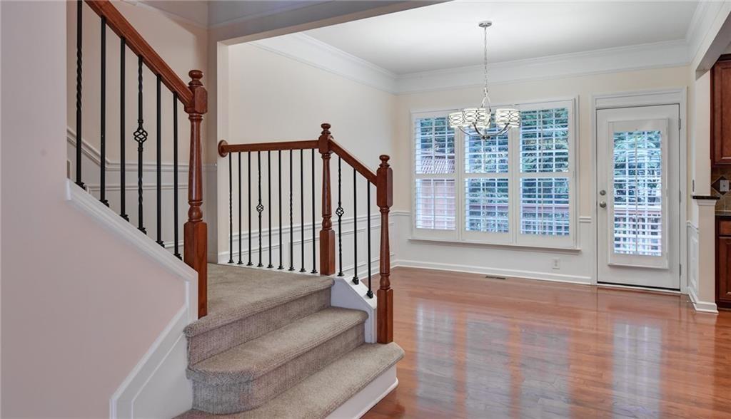 2804 Loftview Square, Unit 3 Atlanta, GA 30339 - Photo 16 of 36 a view of an entryway with wooden floor and door