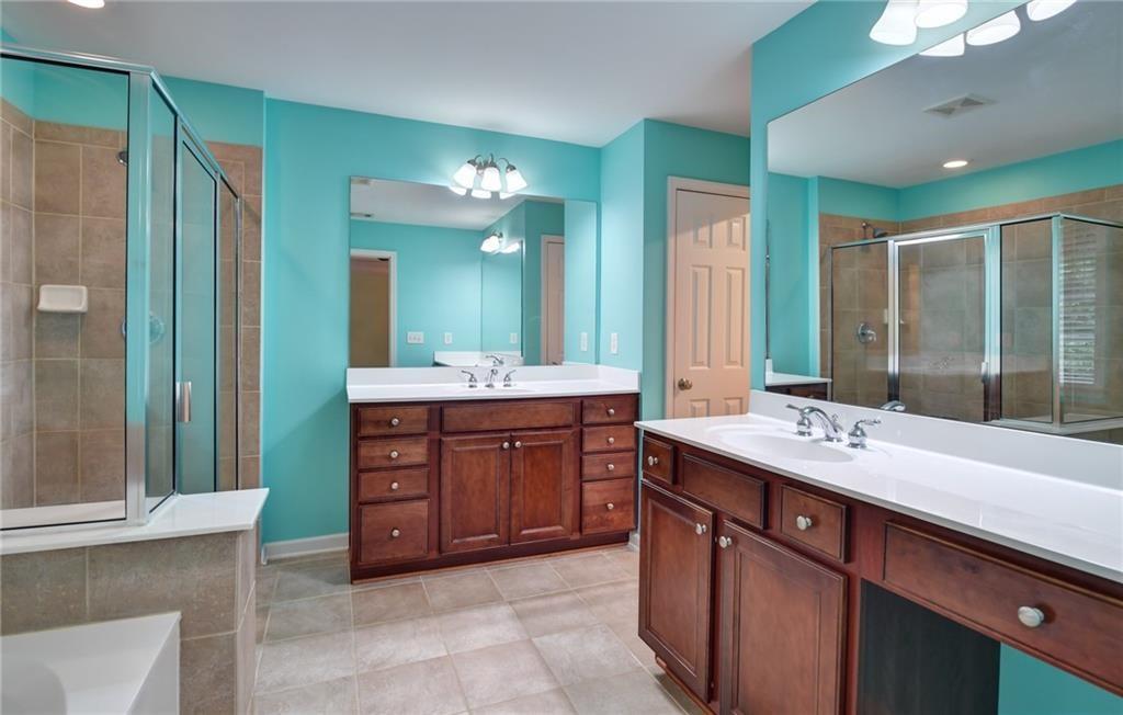 2804 Loftview Square, Unit 3 Atlanta, GA 30339 - Photo 25 of 36 a bathroom with a vanity sink and a mirror