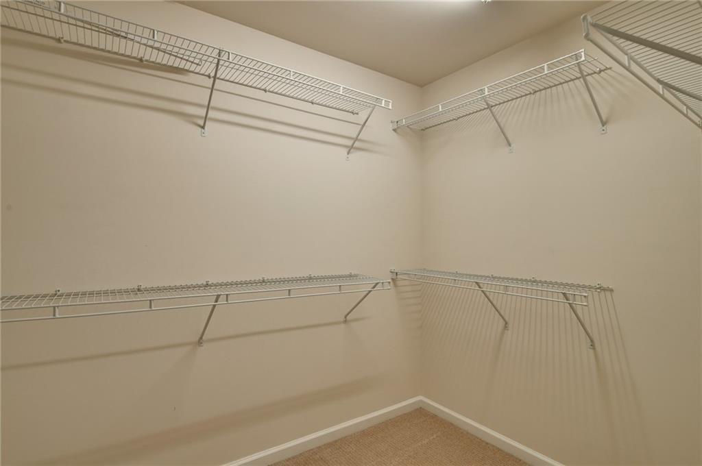 2804 Loftview Square, Unit 3 Atlanta, GA 30339 - Photo 27 of 36 a view of a room with racks on the wall