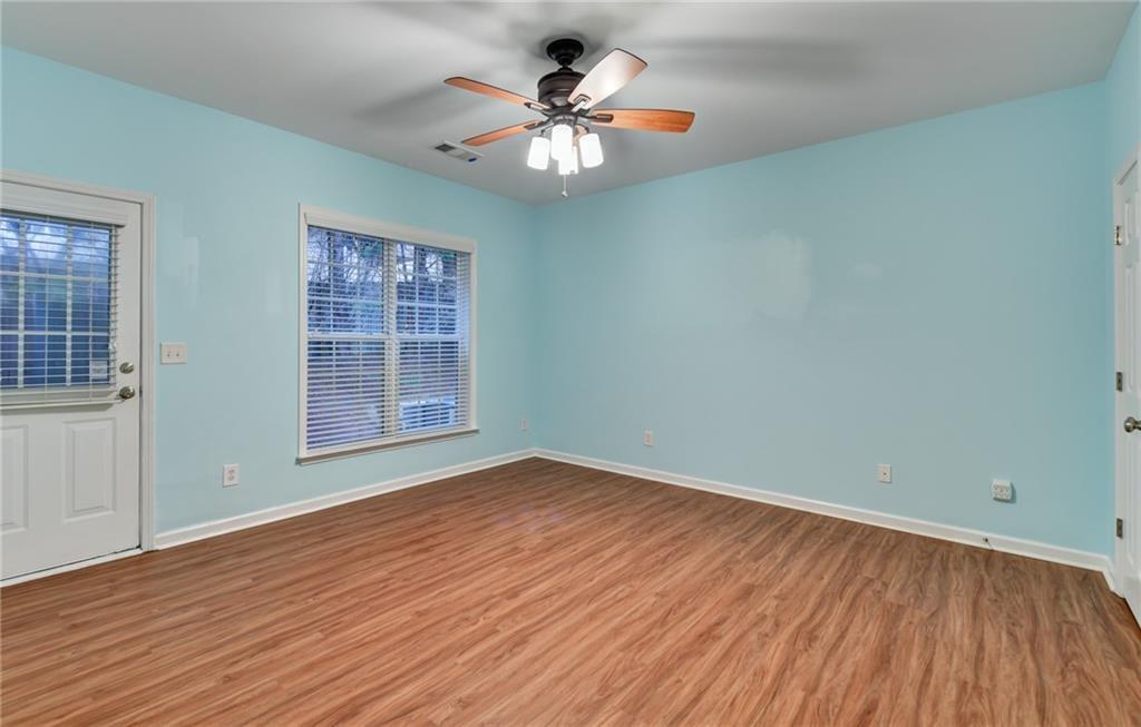 2804 Loftview Square, Unit 3 Atlanta, GA 30339 - Photo 33 of 36 wooden floor in an empty room with a window