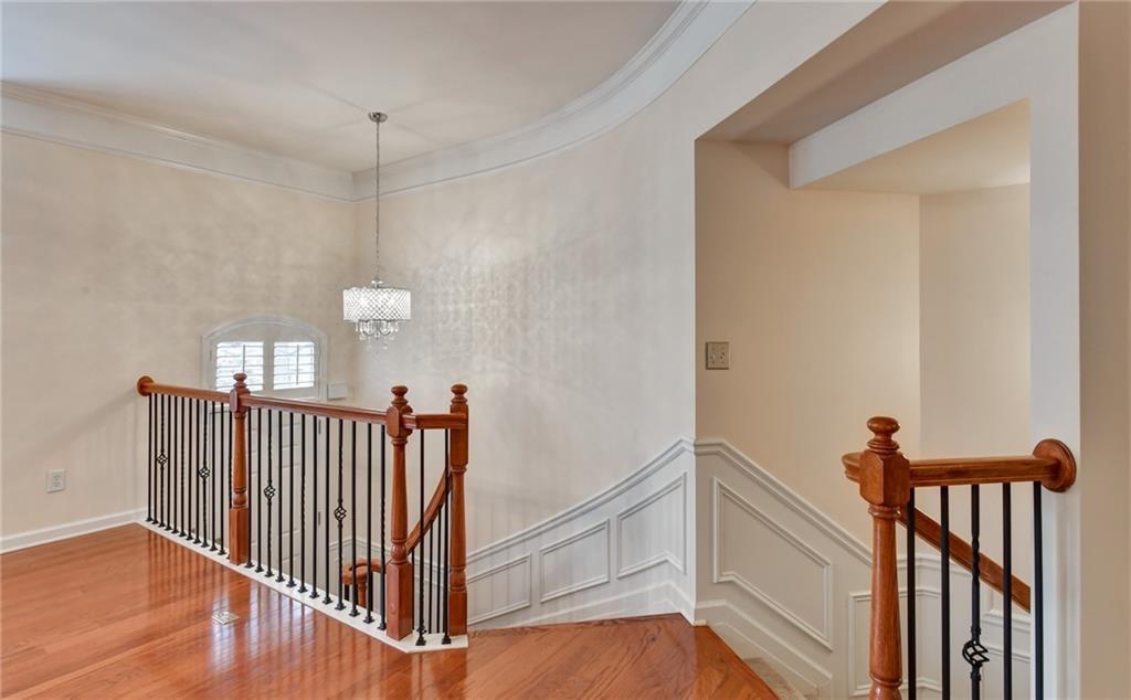 2804 Loftview Square, Unit 3 Atlanta, GA 30339 - Photo 4 of 36 a view of hallway with a door and wooden floor