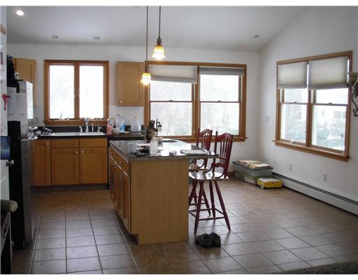 2 Cucumber Hill Road Foster, RI 02825 - Photo 6 of 6 Kitchen. Open floor plan, cathedral ceilings, tile in kitchen