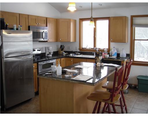 2 Cucumber Hill Road Foster, RI 02825 - Photo 2 of 6 Kitchen. Breakfast bar adds extra counter space and seating