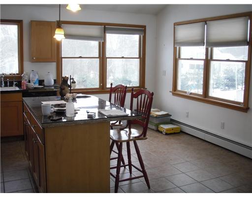2 Cucumber Hill Road Foster, RI 02825 - Photo 3 of 6 Kitchen. Plenty of natural light and views of the wooded yard