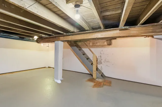 a view of a small space with white cabinets