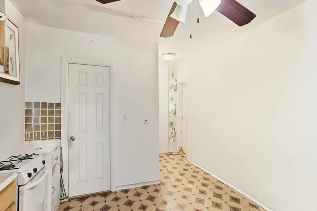 a bathroom with a sink a toilet and a shower