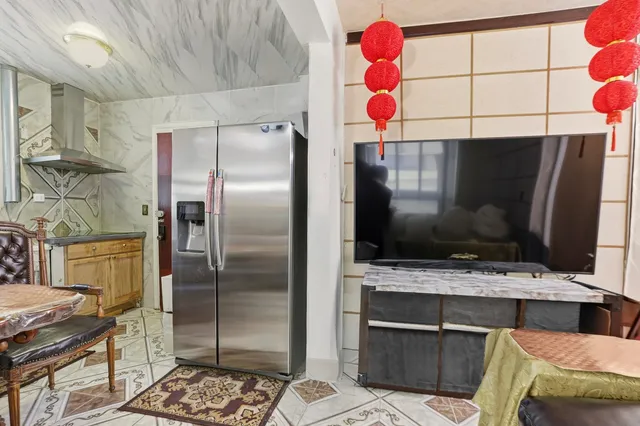 a view of staircase with white walls and railing