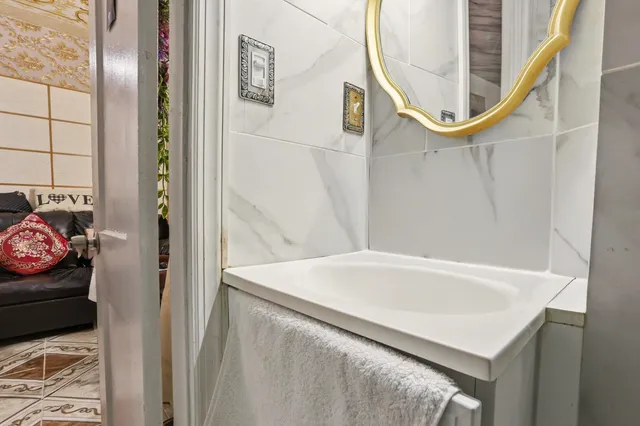 a kitchen with a stove and a refrigerator