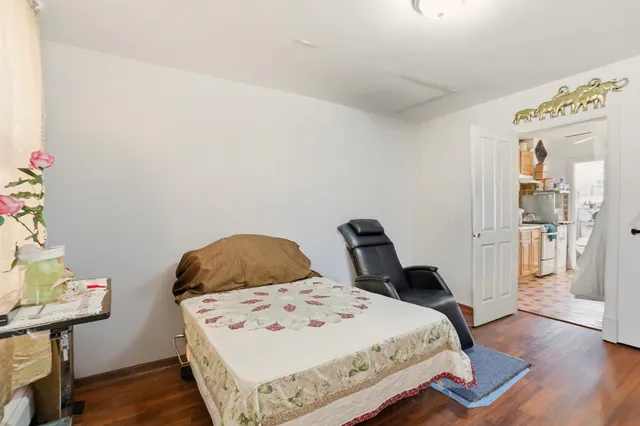 a view of a street with a building in the background