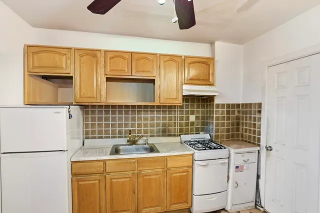 an aerial view of multi story residential apartment building