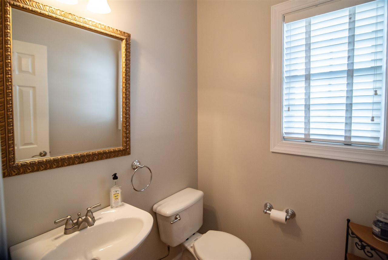 12417 Draco Road Raleigh, NC 27614 - Photo 16 of 30 1st floor hall bath features a pedestal sink. So convenient. Bathroom