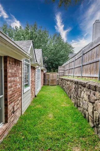 a view of a backyard with a garden